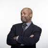 Headshot of Jim Stroud with his arms crossed.
