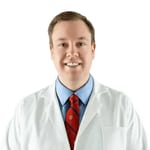 Dr.Niels Oestervemb in a lab coat