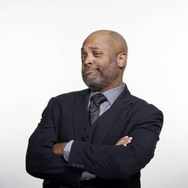Headshot of Jim Stroud with his arms crossed.