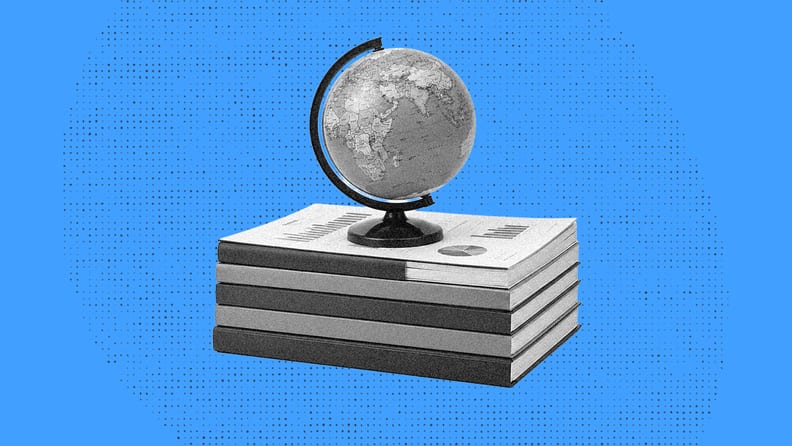 globe on a stack of books for global payroll reporting