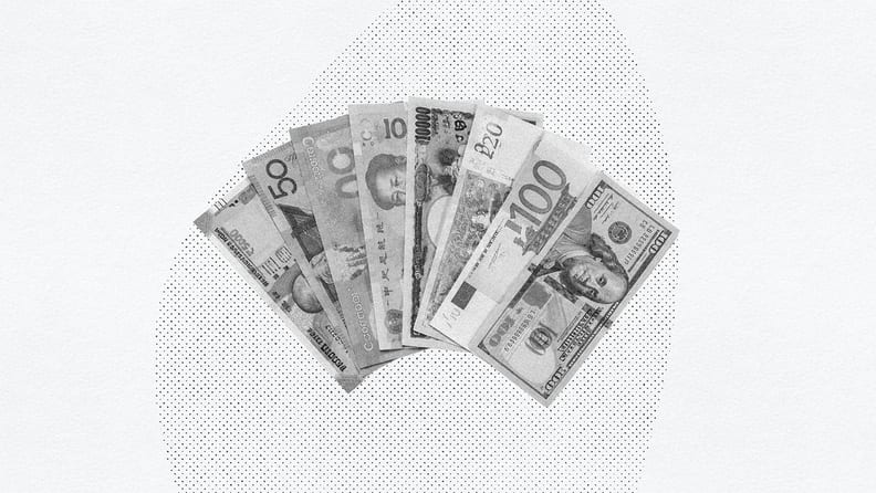 bills in different currencies on a white background for global payroll automation