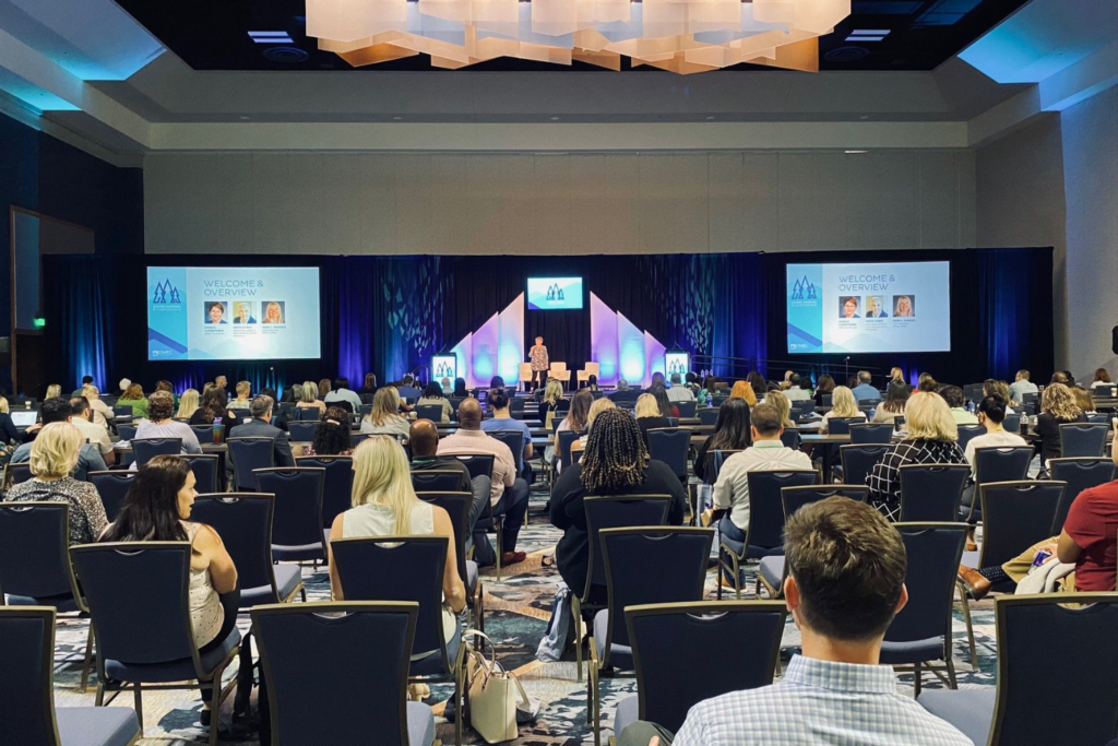 Attendees during a DMEC Conference speaker presentation.