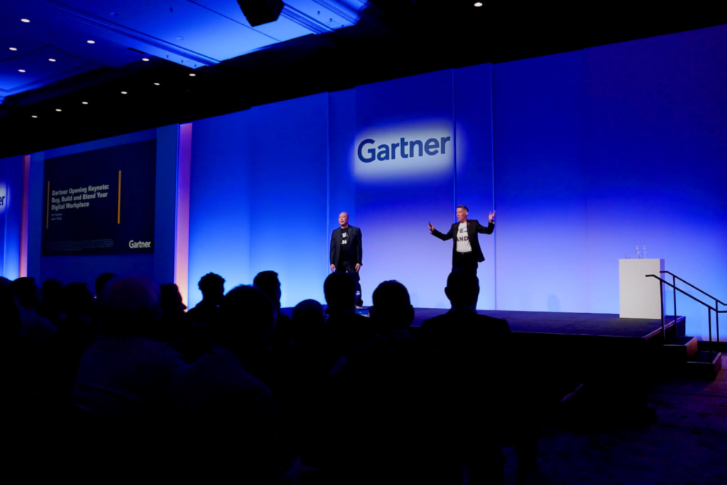 Speakers on stage at the Gartner Digital Workplace Summit.