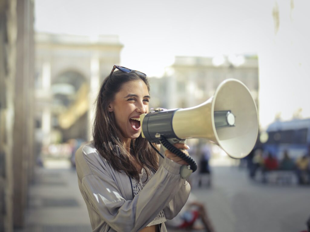 Woman holding a megaphone
