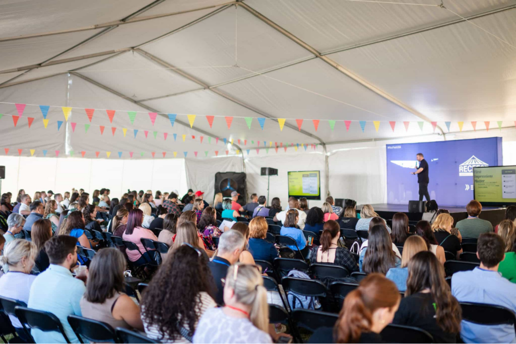 Speaker presenting at the 2025 RecFest USA stage