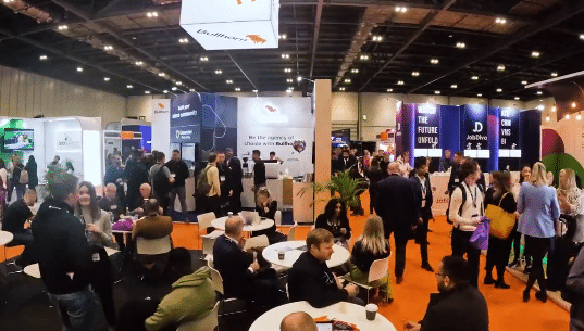 Busy exhibition hall at the Recruitment Agency Expo with attendees