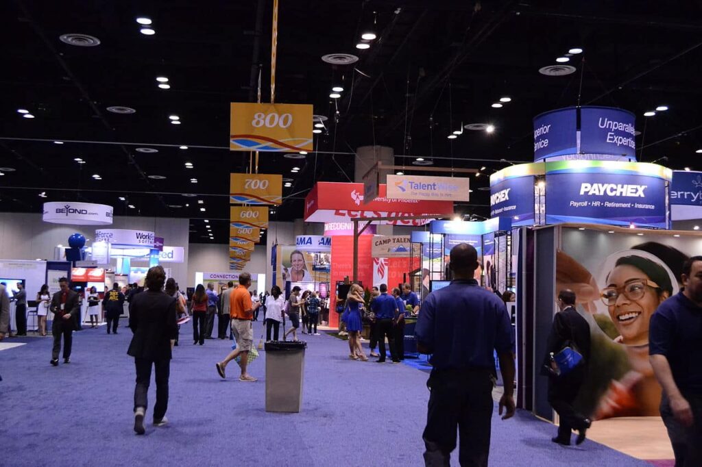 Attendees walking around an exhibition hall at the SHRM Talent Conference &amp; Expo