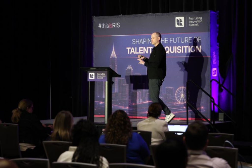 Speaker presenting at the Recruiting Innovation Conference