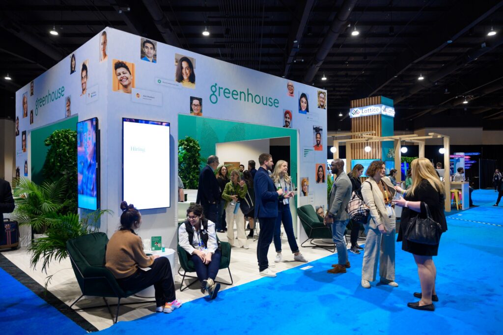 Participants gathering to networking at Transform's conference exhibition floor