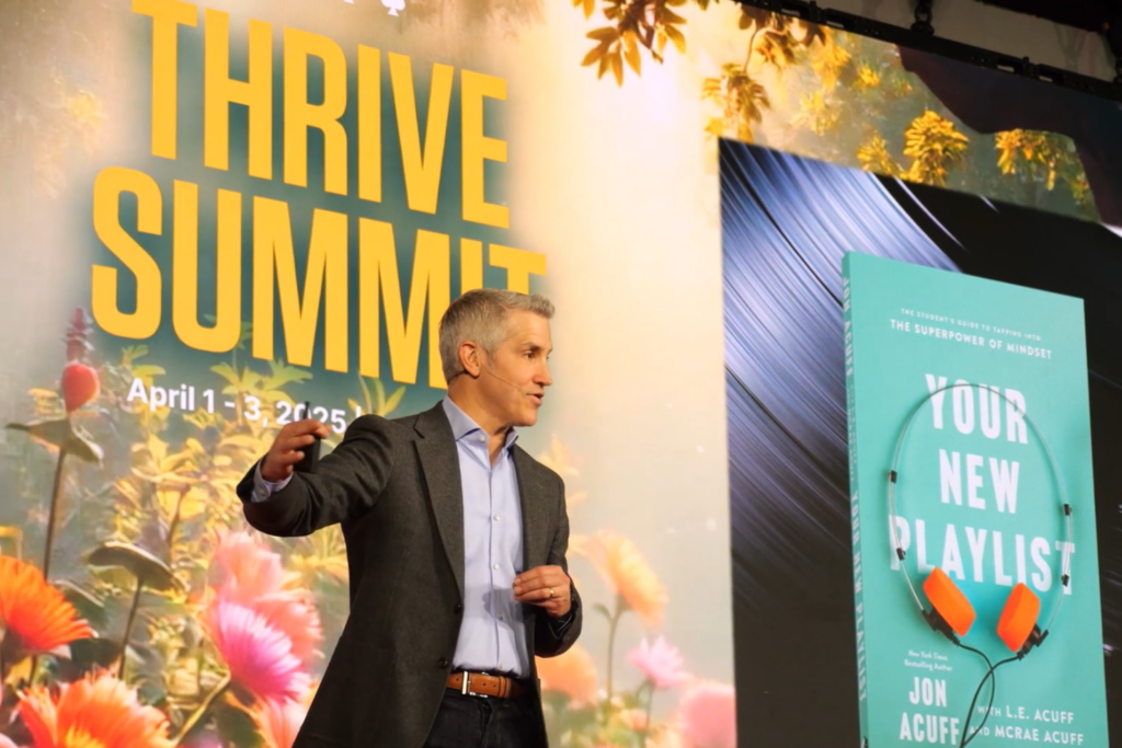 Speaker Jon Acuff, CEO of Acuff Ideas and NYT Bestselling Author, presenting on workplace health and wellbeing strategies at Thrive Summit 2025