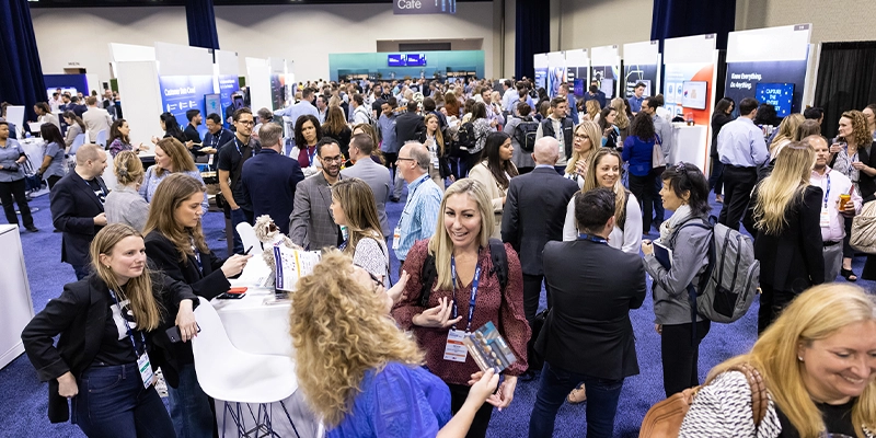 Attendees networking at the Gartner HR Symposium/Xpo