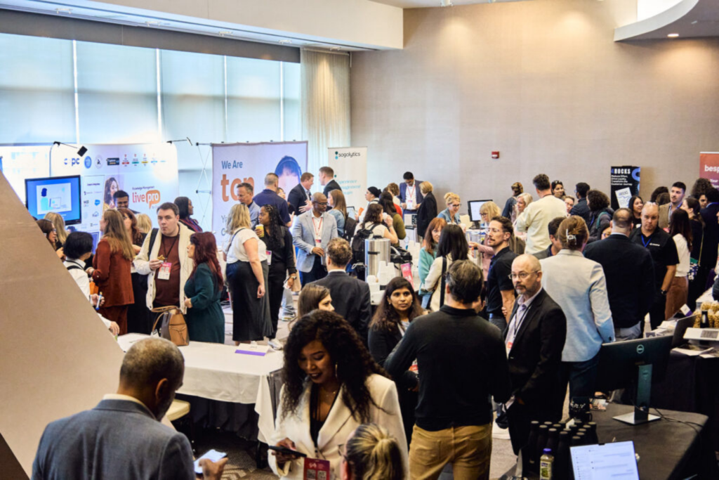 Industry professionals networking at the CXS Summit 2025