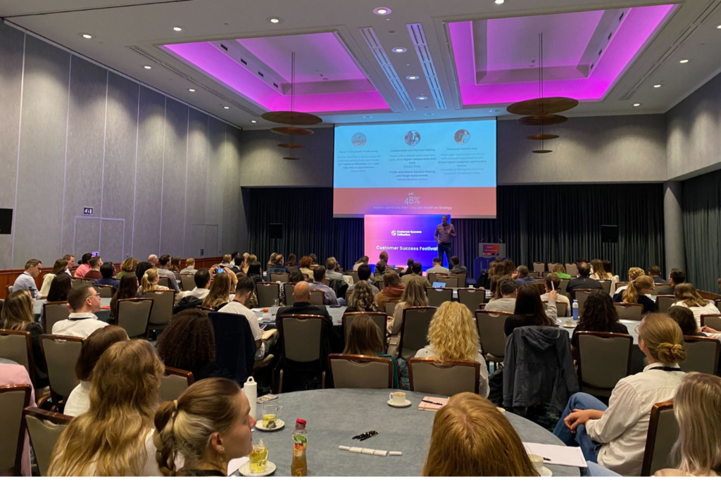 Speaker presenting at the Customer Success Festival 2025