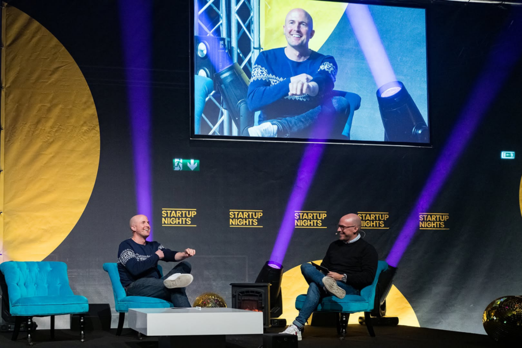 Speakers in a live discussion at Startup Nights conference