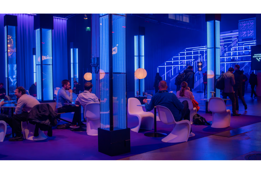 Attendees networking at the event lounge of Slush conference
