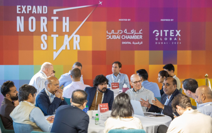 Attendees engaged in a discussion at the Expand North Star conference for founders