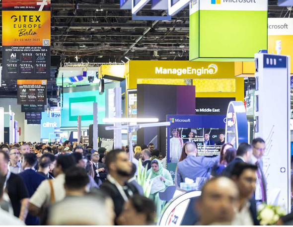 Attendees exploring booths at the GITEX Europe conference for founders