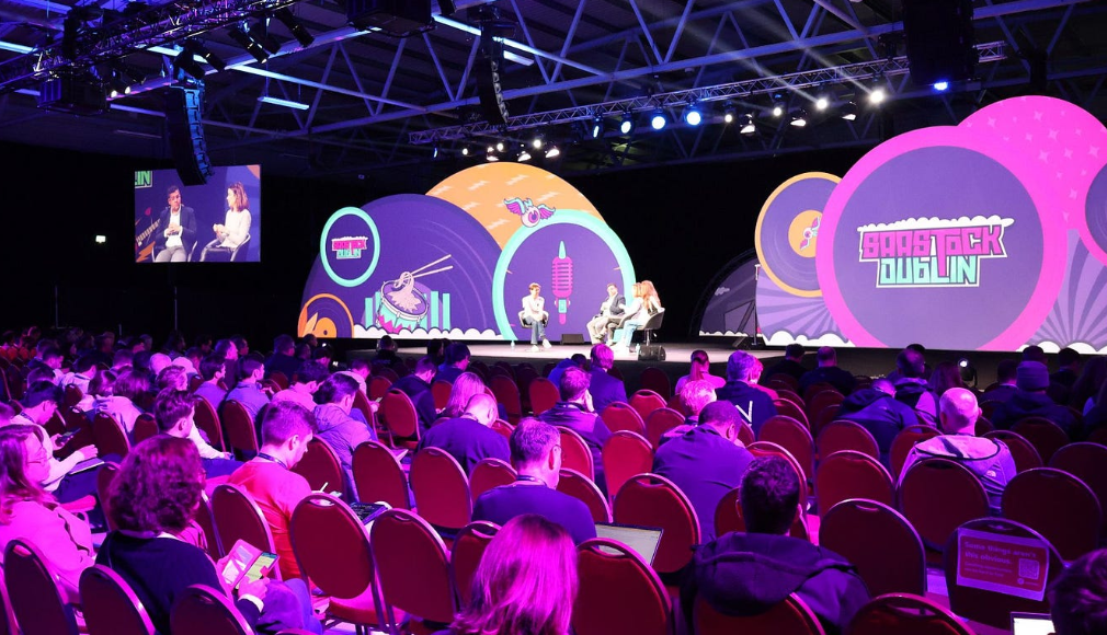 A session at the SaaStock Dublin conference for founders in a vibrant venue