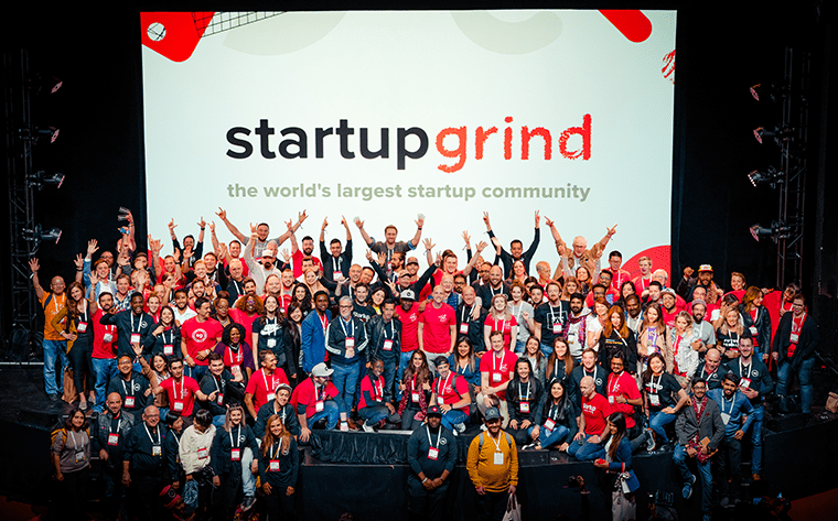 Group photo of diverse attendees at the Startup Grind Conference