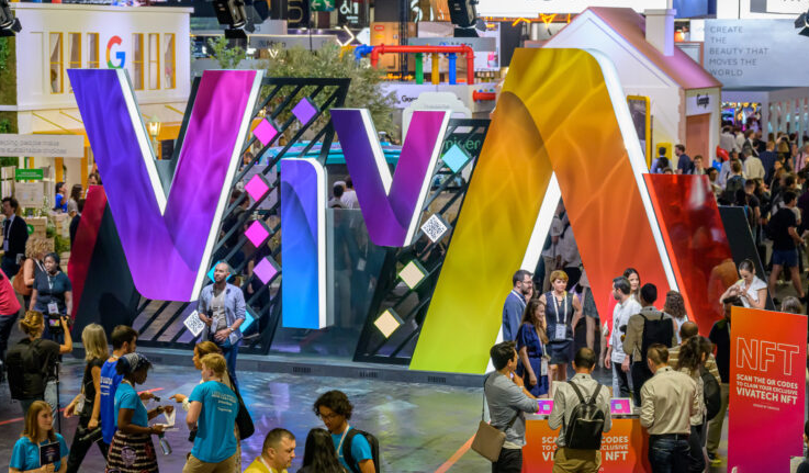 Attendees networking at the Viva Technology conference for founders