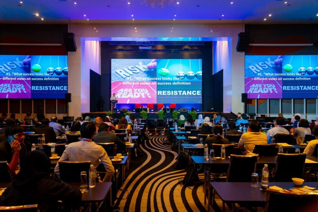 Attendees gathered for a keynote presentation at The Asian Change Management Conference