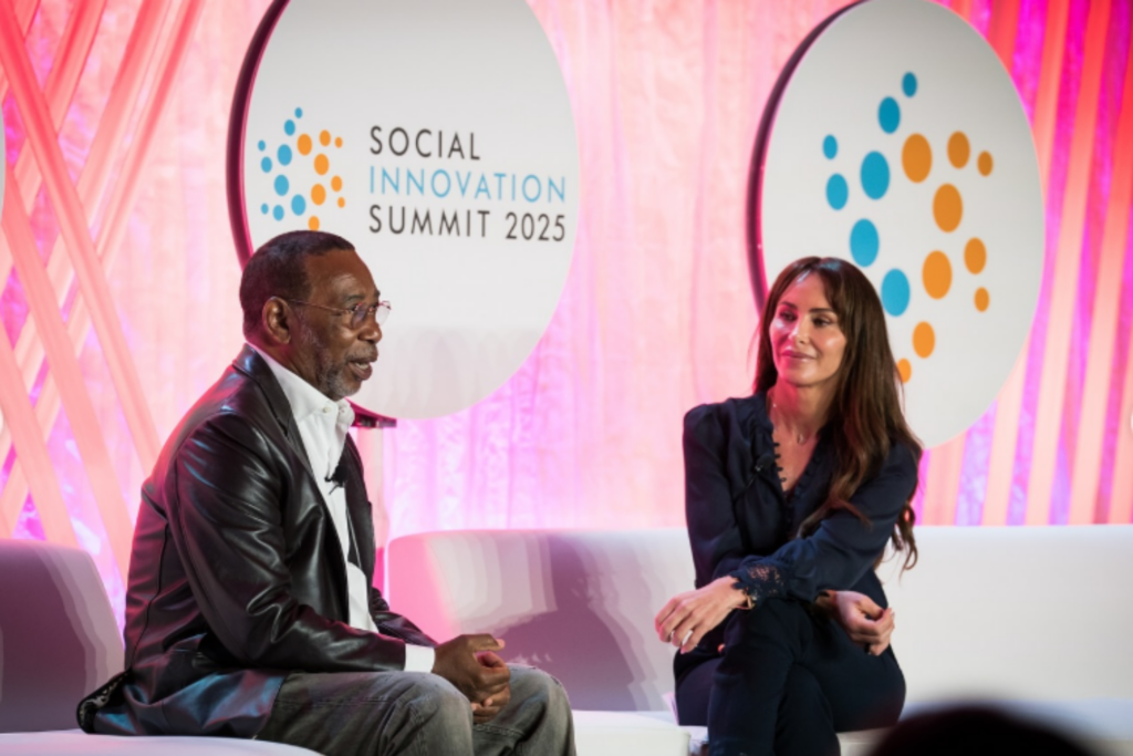 American entrepreneur and public speaker Molly Bloom, together with Larry Miller, President of the Jordan Brand, at the SIS25