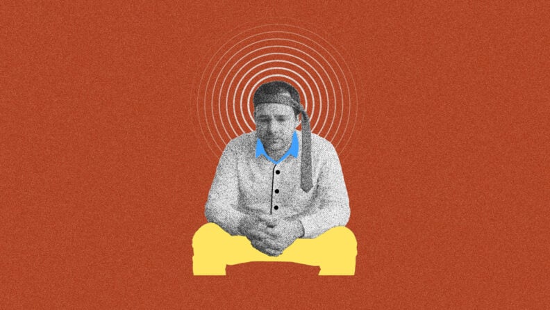 A man looks stressed ponders the impact of a layoff